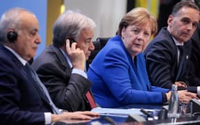 (LtoR) Special Representative Ghassan Salame; Secretary-General of the United Nations (UN) Antonio Guterres; German Chancellor Angela Merkel and German Foreign Minister Heiko Maas give a press conference after a summit on Libya  in Berlin on January 19, 2020.