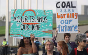 Pacific climate activists outside the Australian parliament