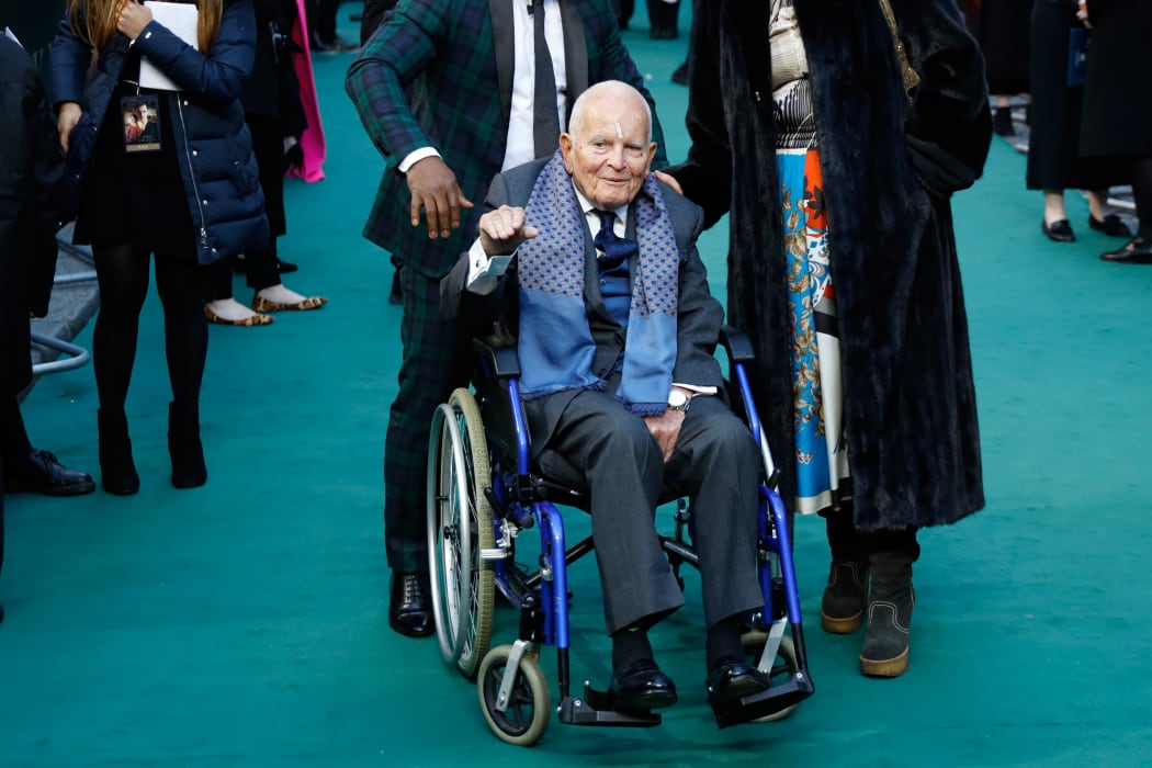 In this file photo taken on April 29, 2019 British actor Ian Holm poses on the red carpet arriving for the UK premiere of the film Tolkein in London.