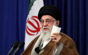 A handout picture provided by the office of Iran's Supreme Leader Ayatollah Ali Khamenei on May 10, 2020 shows Khamenei speaking via a video conference with members of the Iranian government.