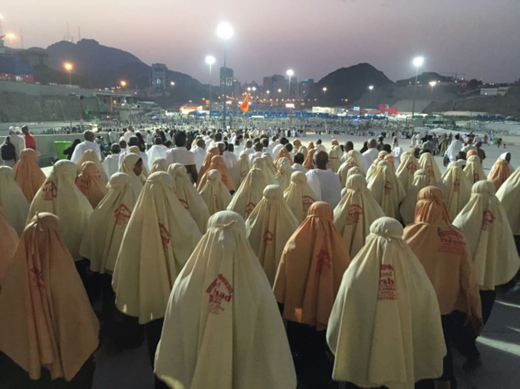 Prospective pilgrims walk to stone the devil during the first day of Eid Al Adha in Mecca.