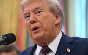 US President Donald Trump speaks in the Oval Office of the White House.