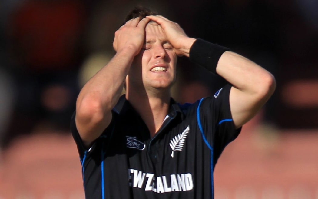 The Black Caps Matt Henry is disappointed after a catch is dropped.