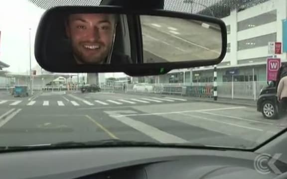 Alex Ashton driving to Auckland Airport