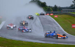 Scott Dixon in the rain in Alabama.