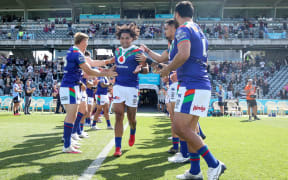 Adam Blair runs out to a guard of honour.