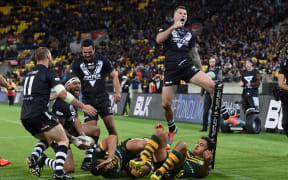 Shaun Kenny-Dowall celebrates Manu Vatuvei's try during the New Zealand Kiwis v Australia Kangaroos Four Nations Rugby League Final. Wellington, New Zealand. Saturday 15 November 2014.