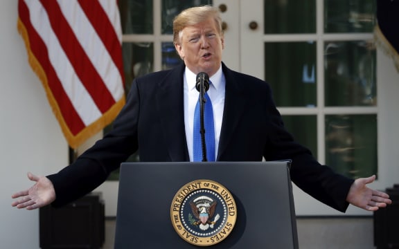 President Donald Trump speaks during an event in the Rose Garden at the White House Friday.
