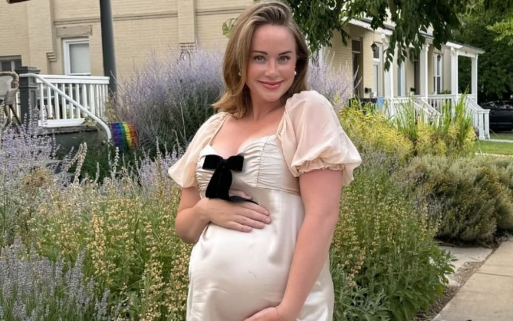 Whitney Leavitt is pregnant with her third child.