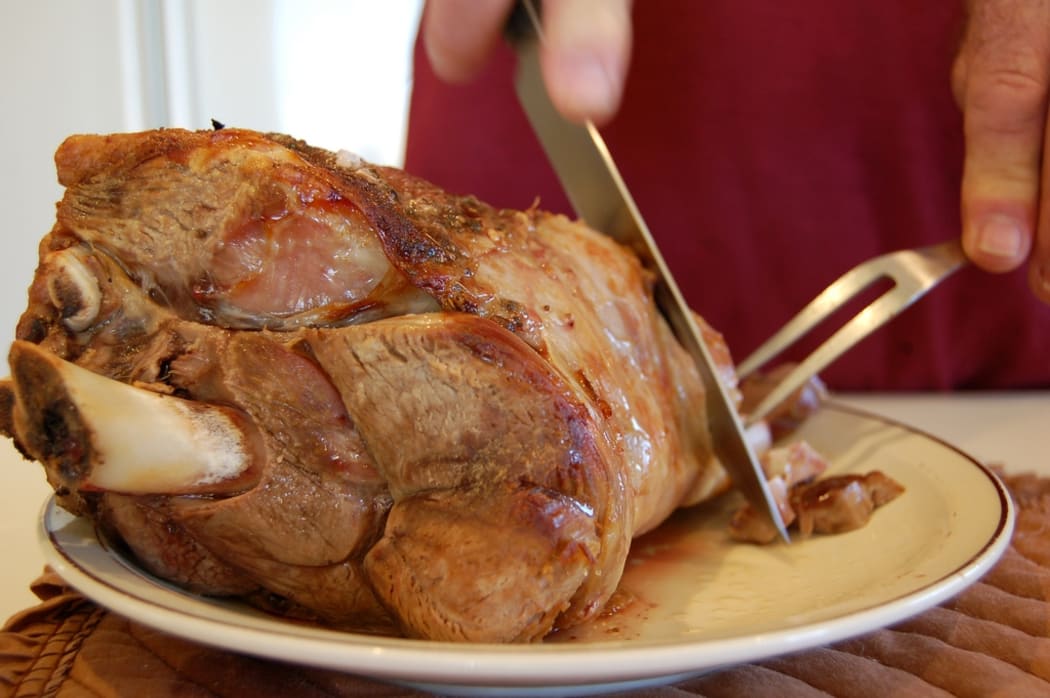 roast lamb being carved