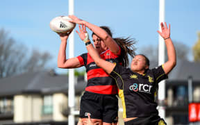 Chelsea Bremner of Canterbury takes a line put ball from Joanah Ngan-Woo of Wellington during the Farah Palmer Cup rugby match, 2020.