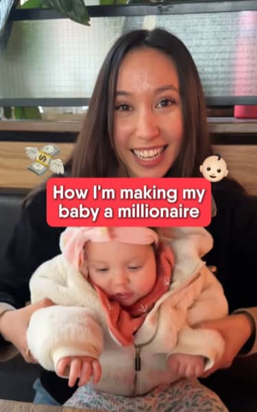 Screenshot of Instagram video of Finfluencer Queenie Tan holding her baby, Gia.