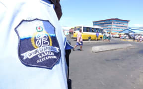 Samoa police badge bearing the country's public seal which reads "Faavae i Le Atua Samoa" which translates to English as "God be the Foundation of Samoa"