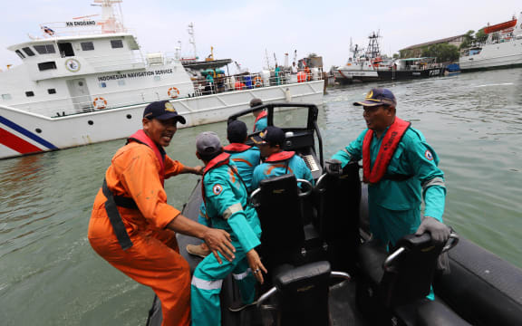 Members of a rescue team prepare to search for survivors from the Lion Air flight JT 610, which crashed into the sea.