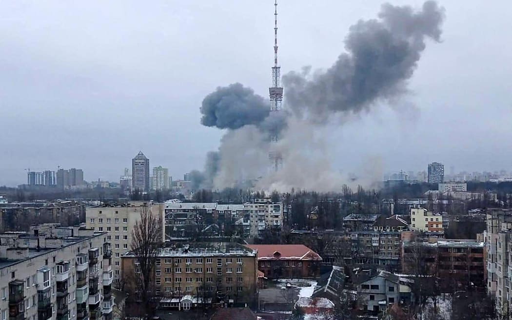 This handout picture released on the Facebook page of the Ukrainian Interior ministry  on March 1, 2022 show the smoke after a missile attack targeting the Ukrainian capitals television centre in Kyiv.