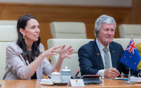 Prime Minister Jacinda Ardern  and Trade Minister Damien O'Connor listen to opening remarks from Vietnamese Prime Minister Pham Minh Chinh (not pictured) in brief talks ahead of signing two agreements on aviation cooperation and working holiday visas, 14 November 2022.