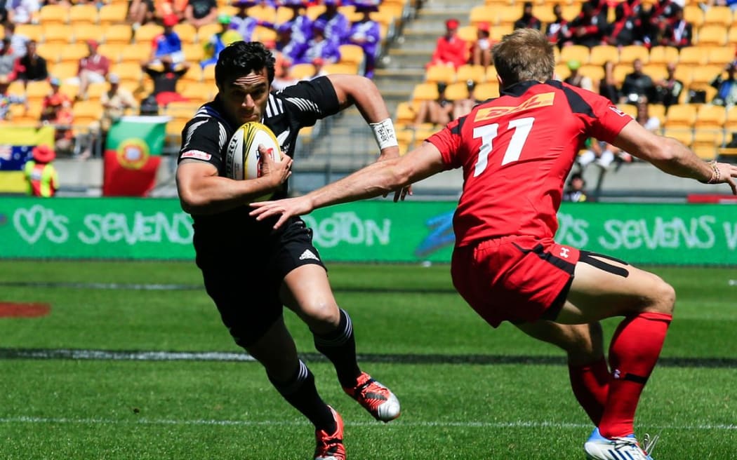 New Zealands' Sam Dickson makes a break against Canada.