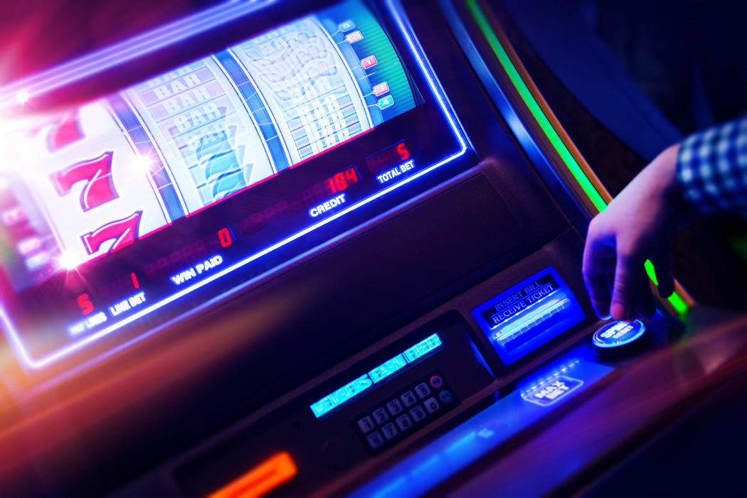 Casino Slot Machine Player Closeup Photo. Digital Slot Machine Spin. Playing in Las Vegas Concept Photo.