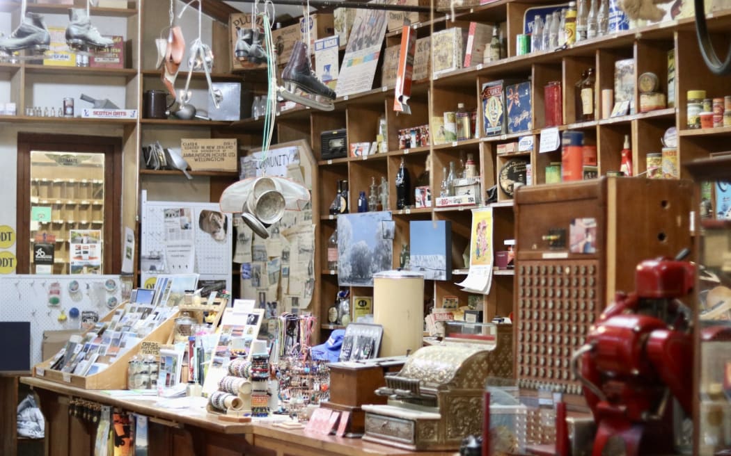 Inside Gilchrist’s Store, shelves brim with everything from memorabilia to day-to-day groceries - part everyday general store, part time capsule for visitors passing through Oturehua.