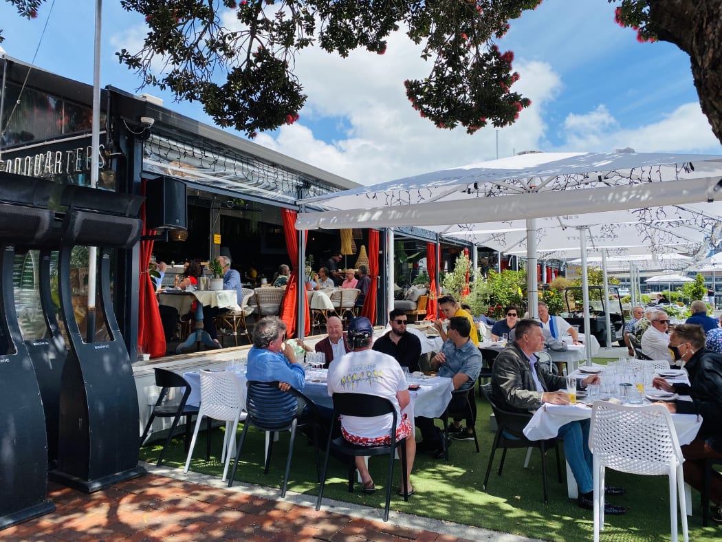 Aucklanders eat out at the Viaduct on the first day of the traffic light system