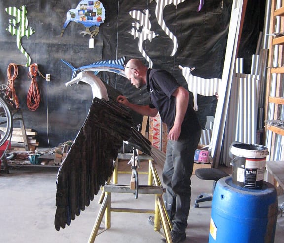 Steven's Corrugated Creations colleague Russell, putting the final touches on a shag for Sheryn's parents.