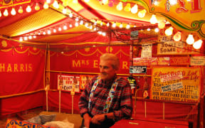 Albert Harris and his coconut shy – Cambridge Midsummer Fair 2005
Albert Harris has been in the fair all his life and runs the Coconut shy established by his mother, Mrs. E. Harris, in 1936.