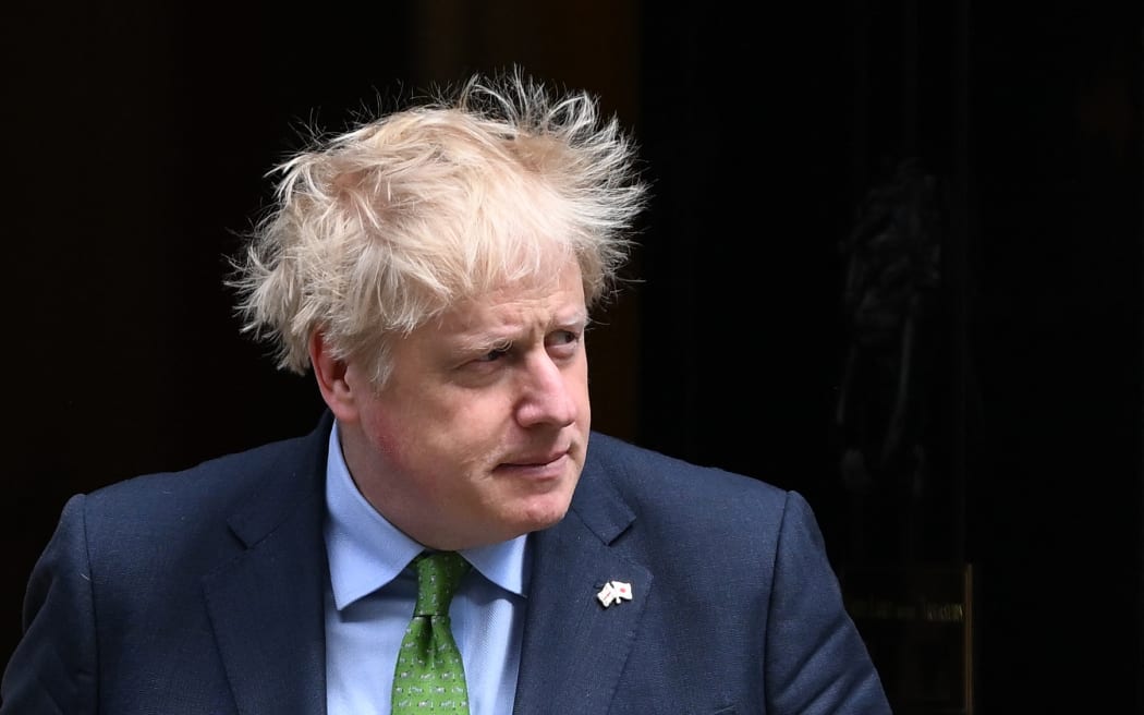 Britain's Prime Minister Boris Johnson steps out of 10 Downing Street to welcome Japan's Prime Minister ahead of their meeting in London, on 5 May 2022.