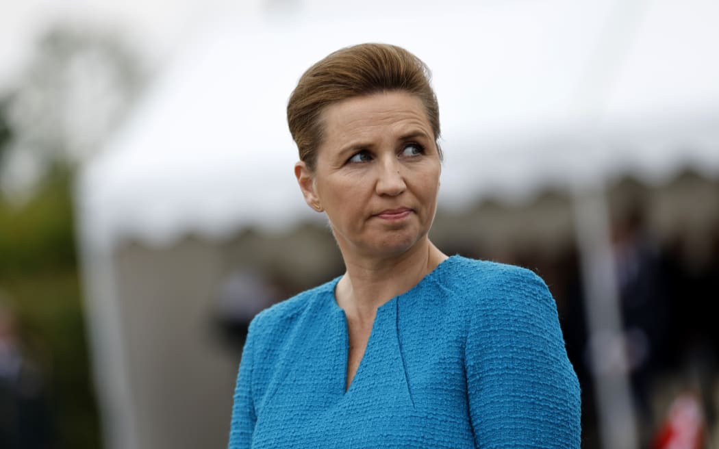 FILE - Denmark's Prime Minister Mette Frederiksen attends a ceremony at the Danish monument outside of Sainte Marie du Mont, Normandy, Thursday, June 6, 2024. Frederiksen has been assaulted by a man on a square in the capital of Copenhagen, according to a report on Friday, June 7, 2024 by the state news agency Ritzau. (AP Photo/Jeremias Gonzalez, File)