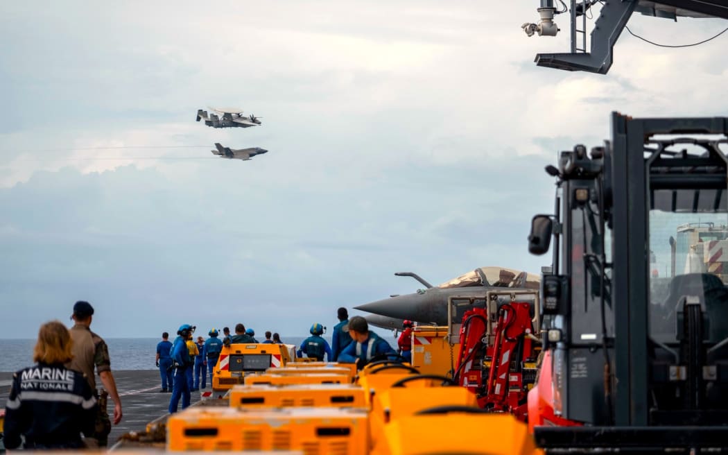 US Navy, French Navy, and the Japan Maritime Self Defence Force aboard French aircraft carrier Charles De Gaulle in the Philippine Sea during exercise Pacific Steller 2025 – 14 February 2025