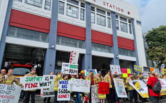 Firefighters on strike outside Auckland Central Fire Station.
