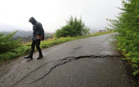 Cracks in Lighthouse Road, Akaroa which led to some houses being evacuated due to landslip fears.