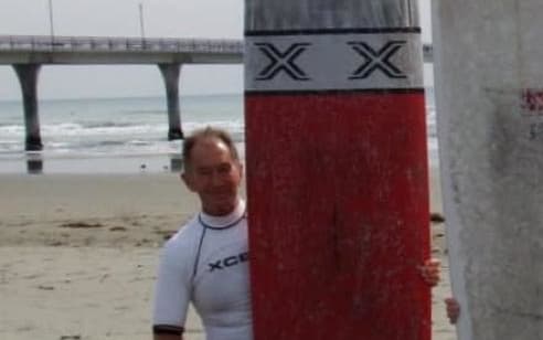 Ron Carter with his Thunderbolt Cruiser longboard