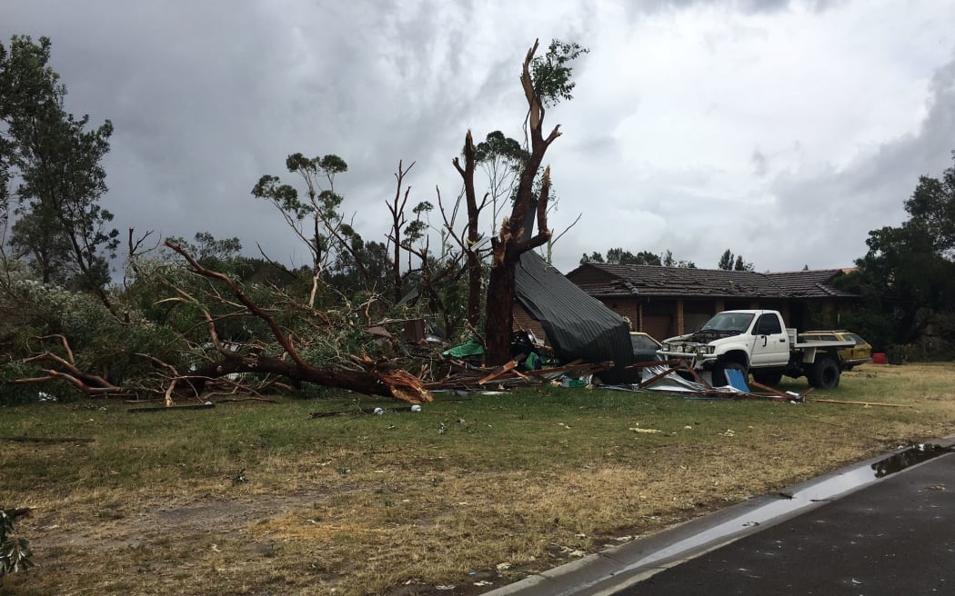 Supplied image obtained Wednesday, Dec. 16, 2015 of the damage caused by severe storm in a street in Kurnell, Southern Sydney