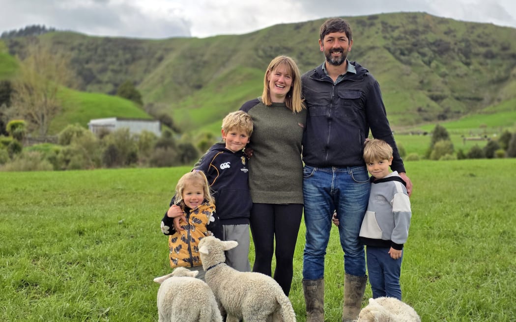 Sophie (L) and Nick Brown with their family.