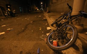 A bicycle lies deformed on the scene of a New Year's Eve stampede in Shanghai.