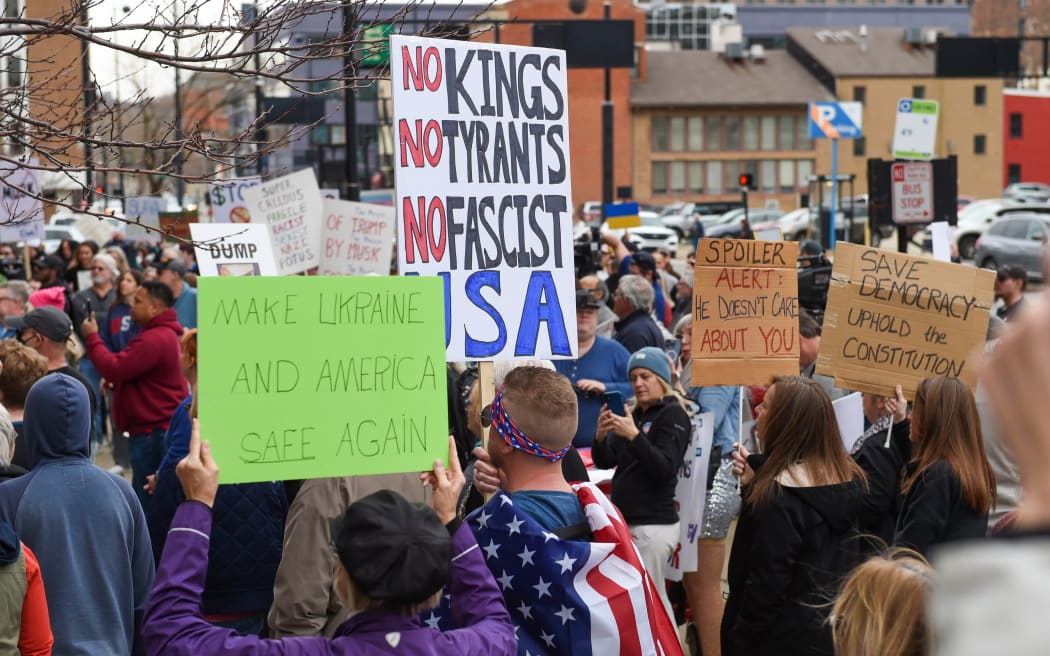 Demonstrators participate in the nationwide 'Defend Democracy' 50501 National Day of Protest to protest against Project 2025, the policies of President Donald Trump, and Elon Musk's role in government outside City Hall in Cincinnati, Ohio, on 4 March, 2025.
