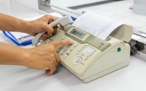 Fax machine.