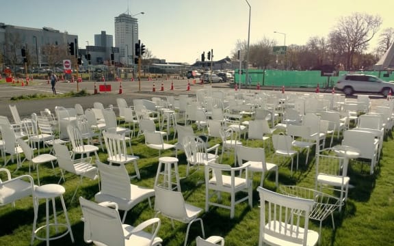 185 White Chairs art installation in Christchurch.