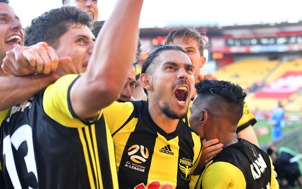 Phoenix's David Williams celebrates a goal with team mates.