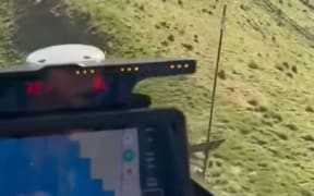 A screen shot from the video posted by a pilot showing their near miss with a radio tower (to the right) which they failed to detect.