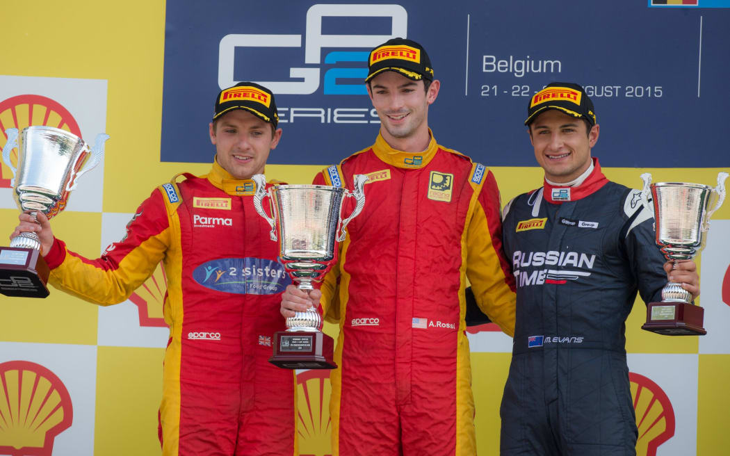 Jordan King, Alexander Rossi and Mitch Evans stand on the podium at Spa, 2015.