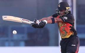 Papua New Guinea's wicketkeeper Kiplin Doriga plays a shot during the ICC men's Twenty20 World Cup cricket match between Bangladesh and Papua New Guinea.