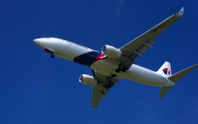 A Malaysia Airlines Boeing 737 prepares to land in Kuala Lumpur.