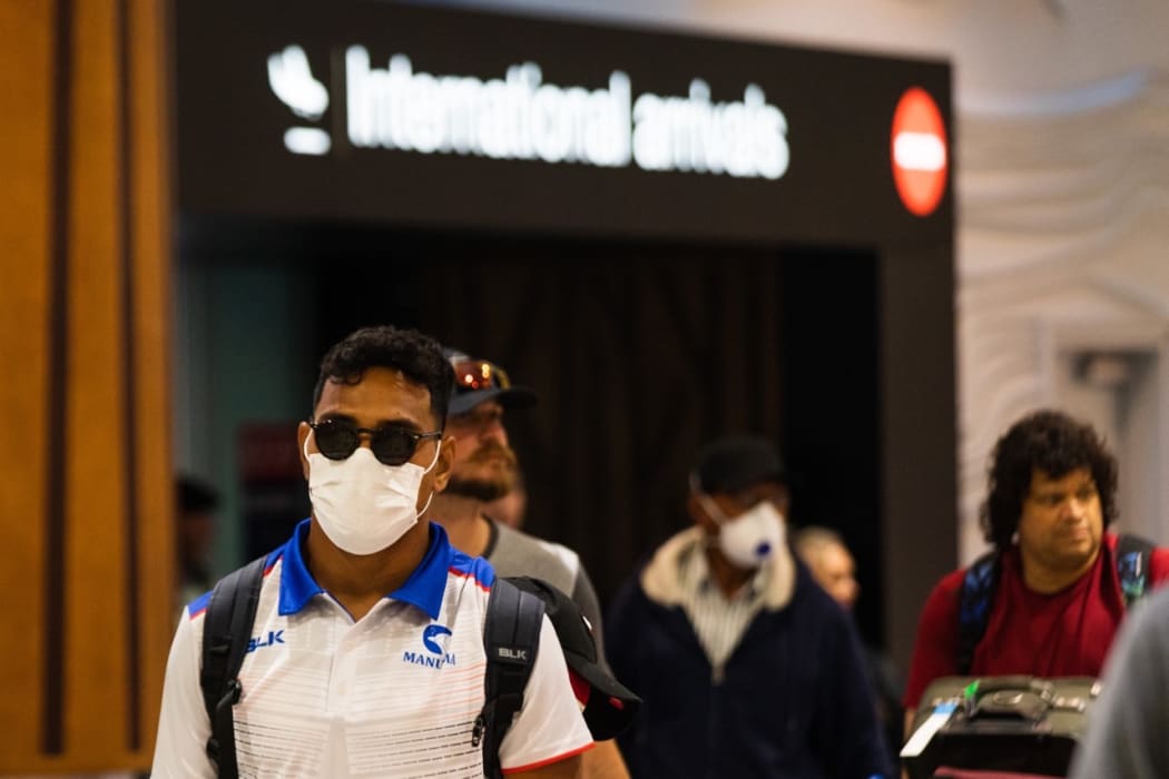 Passengers arrrive at Auckland Airport Monday 16 March