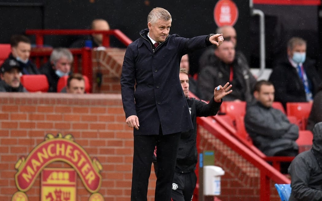 Manchester United's Norwegian manager Ole Gunnar Solskjaer gestures during the English Premier League football match between Manchester United and Everton at Old Trafford in Manchester, north west England, on October 2, 2021.