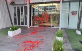 Red paint dripping down the doors of the United States consulate and Ministry of Foreign Affairs building in Auckland on 14 November, 2023.