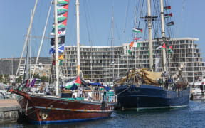 Vessels, part of the Global Sumud Flotilla, are moored at the port of Bizerte in northern Tunisia on September 13, 2025. The ships of the flotilla are expected to leave the port for Gaza in an attempt to break the Israeli siege. The Global Sumud Flotilla is an international solidarity mission that brings together activists, politicians, humanitarian groups, and public figures from more than 44 countries to challenge Israel's blockade of Gaza amid ongoing attacks on the enclave. Days earlier, the Flotilla's main ships, 'Family' and 'Alma', respectively sailing under the Portuguese and the UK flags, are hit by a drone strike in Tunisian waters at the port of Sidi Bou Said, according to the crew.
