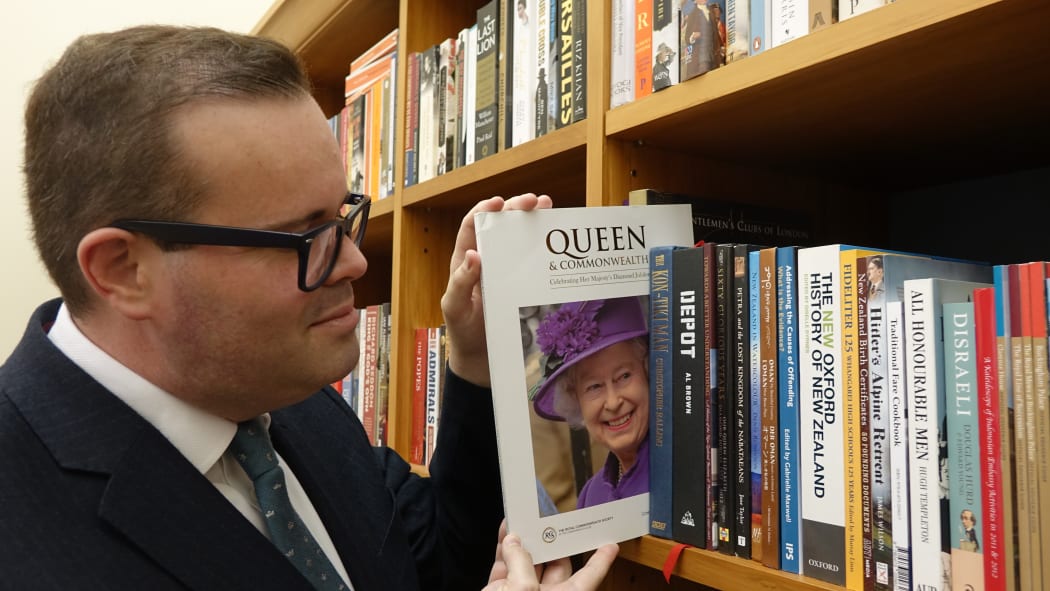 National MP and royalist Paul Foster-Bell poses with the Queen.