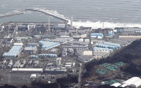 An aerial photo shows Fukushima No. 1 Nuclear Power Plant in Okuma town, Fukushima Prefecture on February 12, 2022. The nuclear plant was damaged by a massive tsunami during the Great East Japan Earthquake on March 11, 2011. The crippled nuclear station has been under decommissioning. ( The Yomiuri Shimbun ) (Photo by Toshikazu Sato / Yomiuri / The Yomiuri Shimbun via AFP)