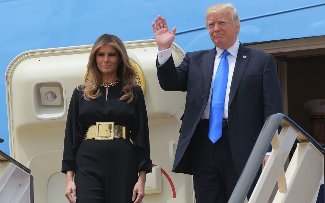 US President Donald Trump and First Lady Melania Trump step off Air Force One upon arrival in Riyadh.
